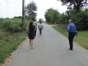 SCSJ staff and clients take investigators on the 1.5 mile detour created by bridge removal