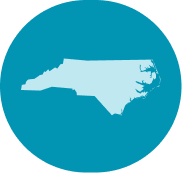 North Carolina silhouette on blue circular background